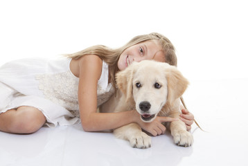 child playing with pet dog