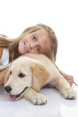 young child with family pet dog