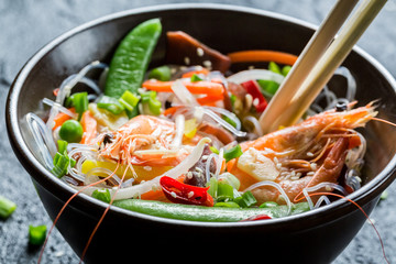Shrimp and vegetables served with noodles