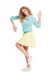 Fototapeta premium Beutiful girl in color dress. Fashion photo. Isolated on white b