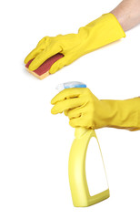 Cleaning surface in bright yellow gloves with sponge and cleanin