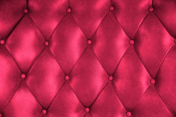 Luxury upholstery leather button chair texture in magenta