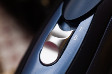 Blue ON/OFF or power switch.