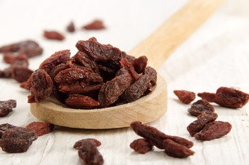 goji berry on a wooden spoon