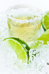 gold tequila with salt and lime