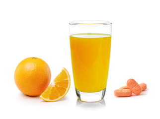 Orange juice in glass, Orange fruit with vitamin c tablet on whi