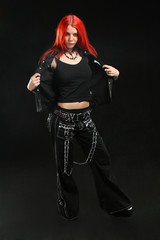 Nice red hair girl in black dress with empty shirt