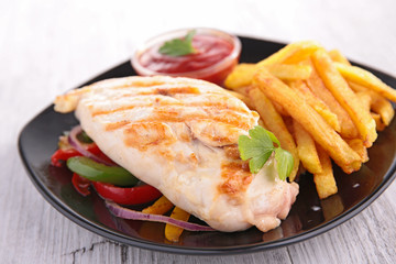 chicken breast and fries