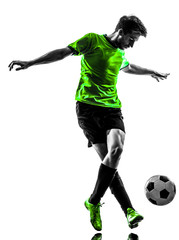 Fototapeta na wymiar soccer football player young man dribbling silhouette