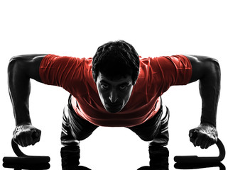 man exercising fitness workout push ups  silhouette