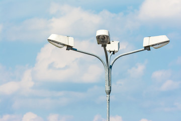 Street Light On Blue Sky With White Clouds