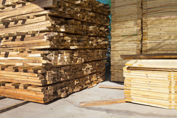 stack of pile wood bar in lumber yard factory use for constructi