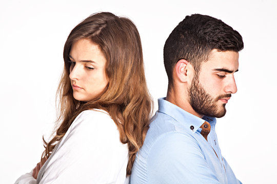 Young mixed-race couple having ralationship problems isolated on