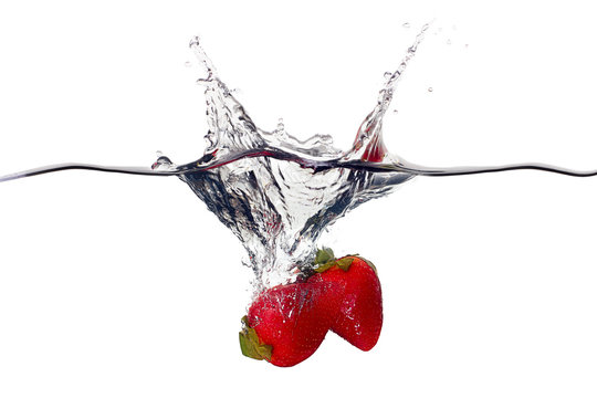 Fresh Strawberries Splash in Water Isolated on White Background