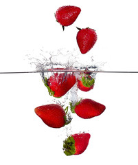 Fresh Strawberries Splash in Water Isolated on White Background