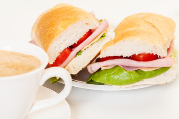 Panini sandwich with ham, cheese and tomato