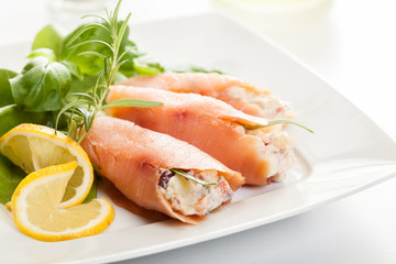 Smoked salmon roll with vegetable salad