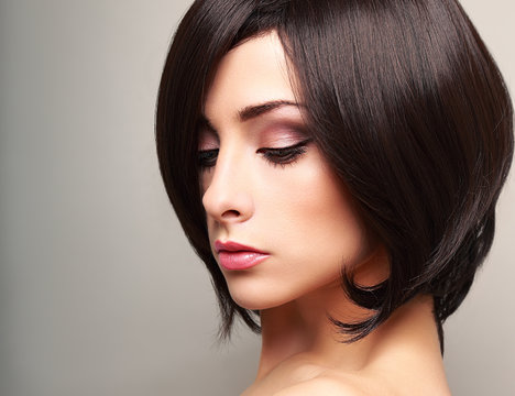 Beautiful bright makeup woman profile with black short hair