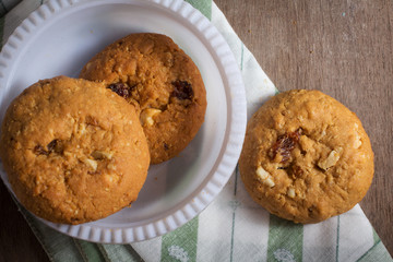 Cookies on table cloth top view.