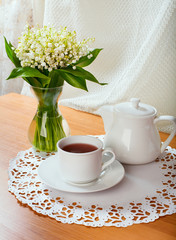 morning tea table setting with Lily of the valley flowers