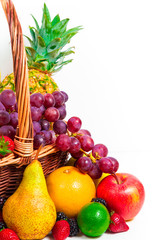Variety of fresh fruits in wicker basket