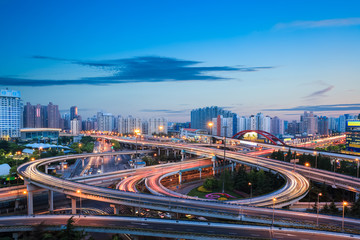 Fototapeta na wymiar modern city interchange overpass in nightfall