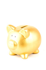 gold piggy bank isolated white background