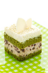 Matcha green tea cake isolated on white background