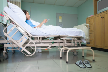 Patient on gurney and watching TV