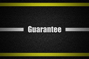 Traffic  road surface with text Guarantee