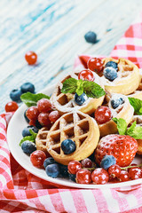 waffles with fresh strawberries, blueberries