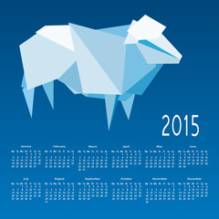 Calendar 2015 with a mosaic sheep on a blue background