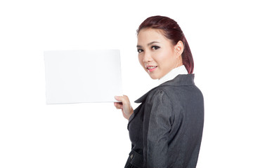 Asian businesswoman turn back show a blank sign
