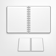 open lined notebook on white background