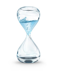 hourglass with dripping water close-up, time concept