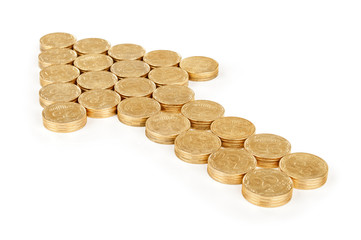 arrow of gold coins on an isolated white background
