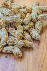 Peanuts on the ground in my kitchen room.