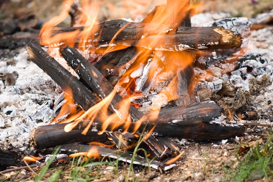 Broken bonfire with flame