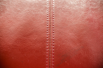 Sewing red leather texture background