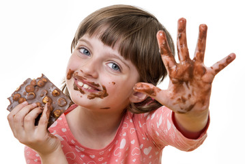 little girl eating chocolate