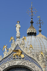 Fototapeta na wymiar Detail of St Mark on top of Basilica San Marco