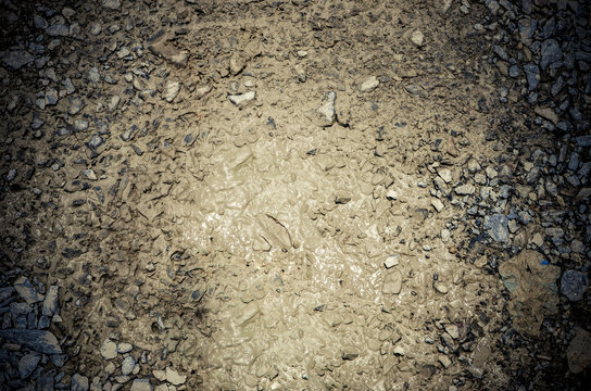 Gravel In Mud Texture Background