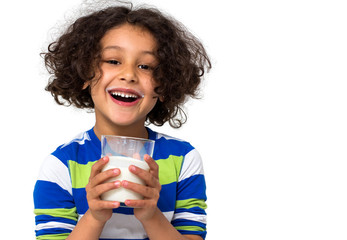 Little girl drinking a glass of milk