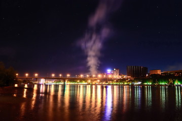 Fototapeta premium Night fire on the waterfront