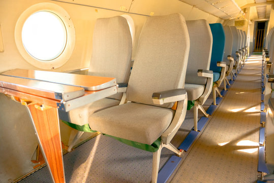 Interior of an airplane with many seats