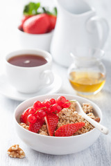 healthy breakfast with granola and strawberry