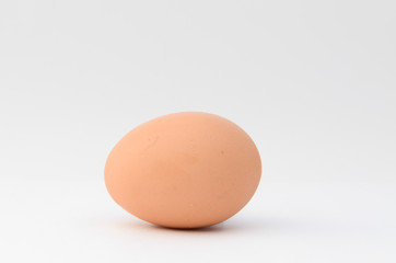 Close up of an egg isolated on white background