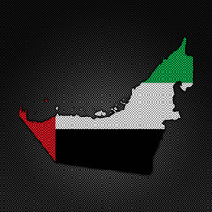 Flag in map on carbon background - Western Sahara