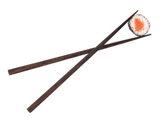 Sushi maki with salmon in chopsticks © Evgeny Karandaev