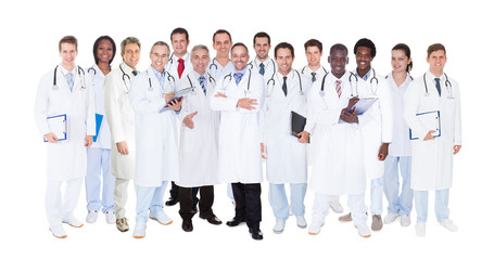 Confident Doctors Against White Background